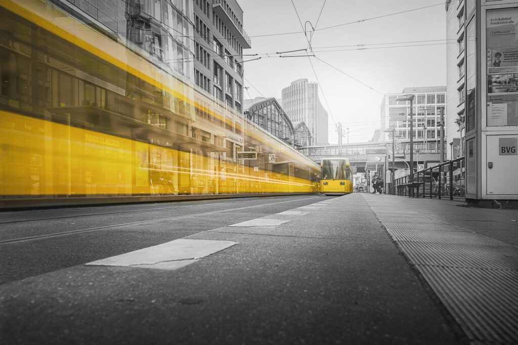 A yellow tram beside city buildings in one of Toronto’s emerging neighbourhoods